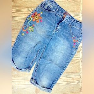 Juniors Jean shorts with embroidered flowers size 16.